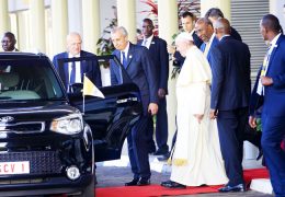 Pope-Francis-being-escorted-to-his-vehicle-by-Vice-President-Dr.-Ruhakanaa-Rugunda